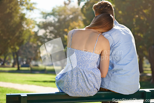 Image of Back of couple, relax in a park and view of nature with hug, love and trust in healthy relationship for commitment. Peace, calm and people in public garden for bonding or romantic date with partner