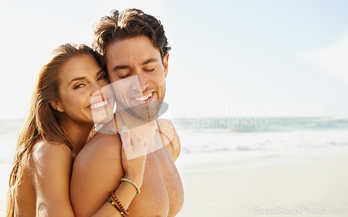 Image of Beach, travel and couple hug with love, care and support, trust and bonding in nature together. Space, face and happy people embrace at sea for mockup, adventure and summer, vacation or Miami holiday