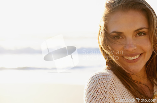 Image of Portrait, beach and woman with vacation, smile and getaway trip with water and weekend break. Face, person and girl with mockup space or ocean with travel, relaxing or peace with adventure or journey