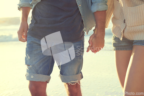 Image of Beach, love and couple holding hands on relax walk, nature journey or travel holiday for outdoor wellness in Peru. Closeup, relationship partner or marriage people on romantic date on tropical island