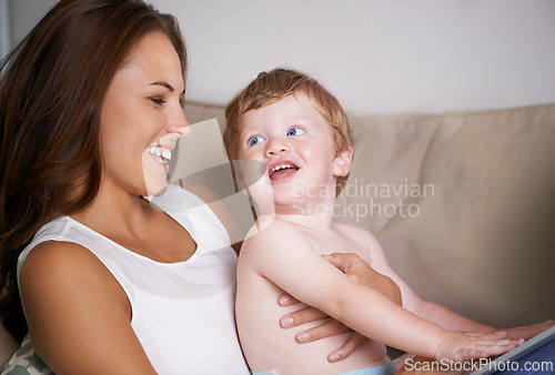 Image of Happy sofa or mom with toddler in home for care, love or smile together to nurture child development. Relax, laugh or single parent mother with baby, boy or kid for support or trust in family house