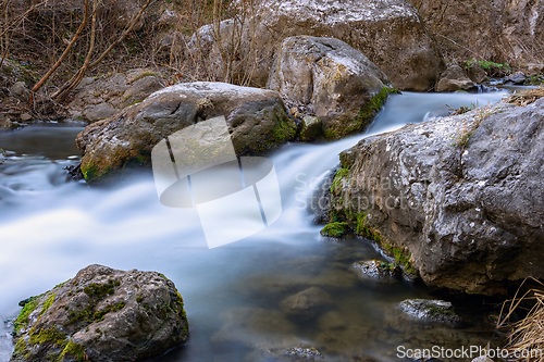 Image of beautiful mountain rapid through the rocks