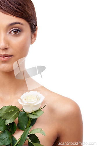 Image of Woman, rose and beauty with half portrait, vegan and model for skincare cosmetics on white background. Makeup, wellness treatment or mockup with shine, flower or organic for glow with healthy skin