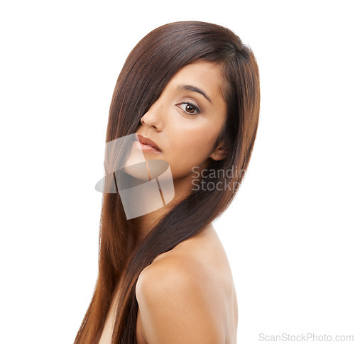 Image of Hair care, shiny and portrait of woman in studio for cosmetic, salon and beauty treatment. Wellness, confident and young female person with healthy conditioner hairstyle routine by white background.
