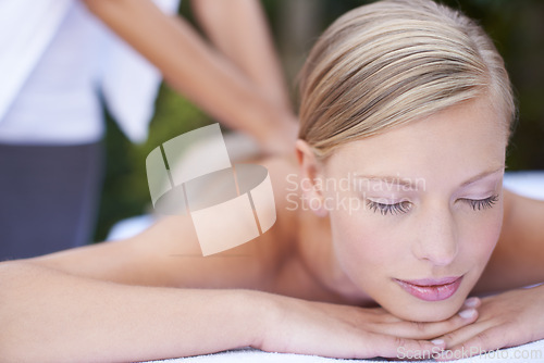 Image of Woman, massage therapist and sleeping for treatment, back and spa for wellness and stress relief therapy. Face, masseuse and relaxing in resort, peaceful and hands for luxury bodycare and tranquility