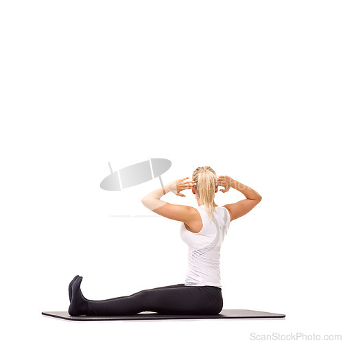 Image of Training, health and mat with woman in studio for stretching, exercise and wellness. Workout, fitness and self care with female person on floor of white background for pilates, body and mockup space
