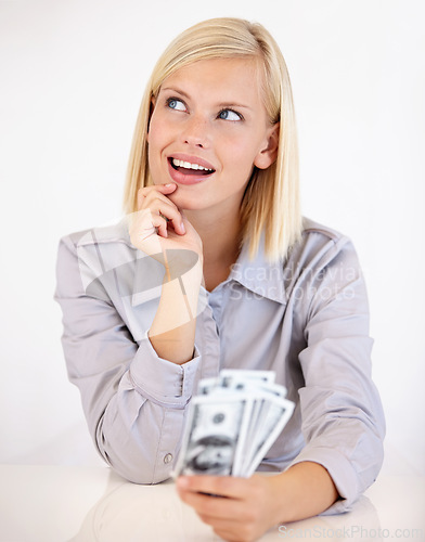 Image of Thinking, woman and money with financial idea, investment and savings for budget with reward. Wealth, wondering and happy person with cash profit from work bonus in studio with white background