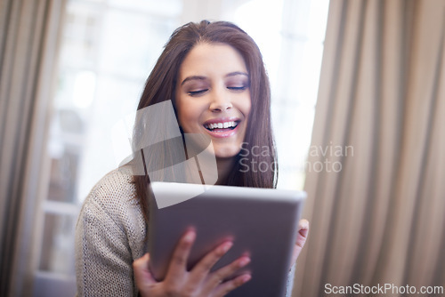 Image of Woman, browsing and tablet for comedy and laughing, app and scrolling on social media at home. Female person, smile and internet connection for comic, technology and funny or silly humor on weekend