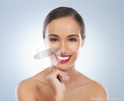 Image of Happy, makeup and portrait of woman with red lipstick in studio with beauty, cosmetic and face routine. Self care, smile and female model with facial cosmetology treatment for glow by gray background