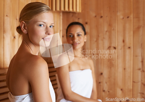 Image of Sauna, portrait and women relax in spa for beauty, healthy detox of sweat for skincare wellness. Luxury, treatment and friends sitting together in steam room for facial, anti aging or benefits