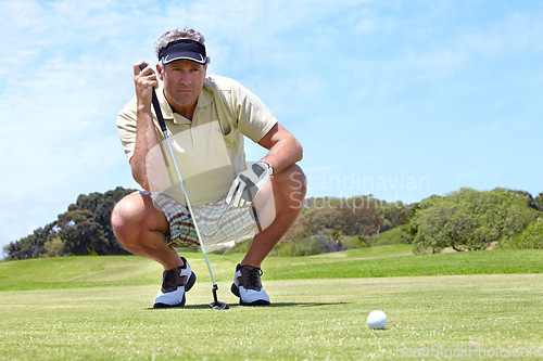 Image of Sport, man and golf on course outdoor for thinking, performance or game with fitness and wellness. Athlete, mature person and golfer with club, ball and exercise on grass for recreation and hobby