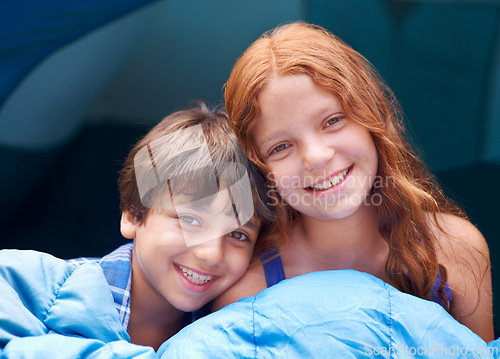 Image of Camping, portrait and children hug in a tent sleeping bag with love, care and bonding in nature together. Happy family, kids and siblings wake up outdoor with trust, games and fun on forest sleepover