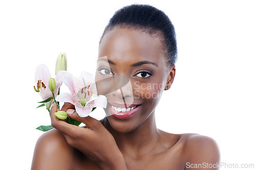 Image of Black woman, flower and portrait with natural beauty, dermatology and skincare for glow and wellness on white background. Nature, skin and sustainable cosmetics, face with shine and orchid in studio