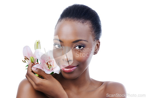 Image of Black woman, flower and portrait for natural beauty, dermatology and skincare for glow and wellness on white background. Nature, skin and sustainable cosmetics, face with shine and orchid in a studio