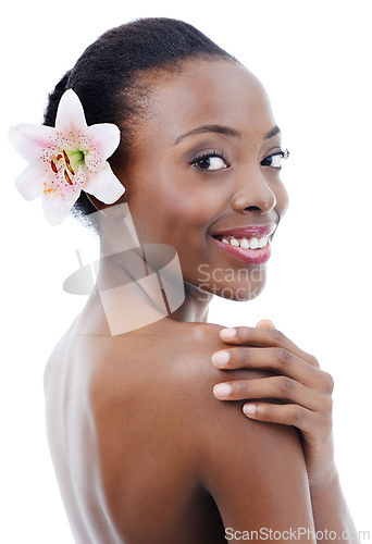 Image of Black woman, skin and flower in portrait, beauty and wellness with dermatology and nature on white background. Orchid, eco friendly cosmetics and body care with natural and clean skincare in studio