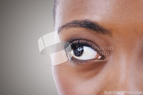 Image of Half, face and eye of woman with vision for contact lenses and healthcare in studio background mockup. Optometry, eyesight and African model seeing, visual or search perception in optical exam