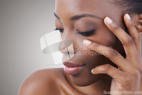 Image of Nails, beauty and black woman closeup with skincare and manicure in studio background, mockup or salon. Facial, makeup and model with natural glow on skin and hand from cosmetics or dermatology