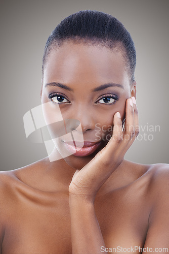 Image of Beauty, portrait and black woman with skincare and dermatology on studio grey background or salon. African, model and natural makeup with healthy glow on skin from self care, cosmetics or facial