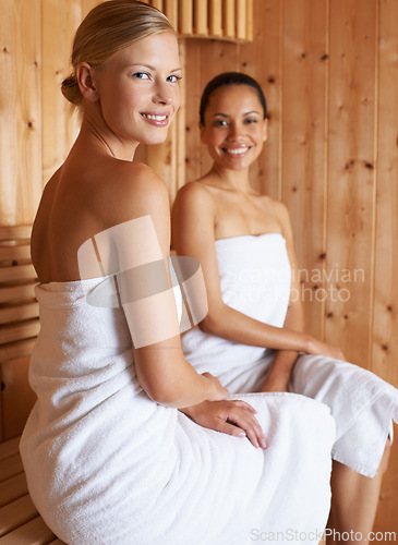 Image of Beauty, portrait and women relax in sauna at spa for healthy detox of sweat for skincare wellness. Happy, treatment and friends sitting together in luxury steam room for anti aging benefits to body