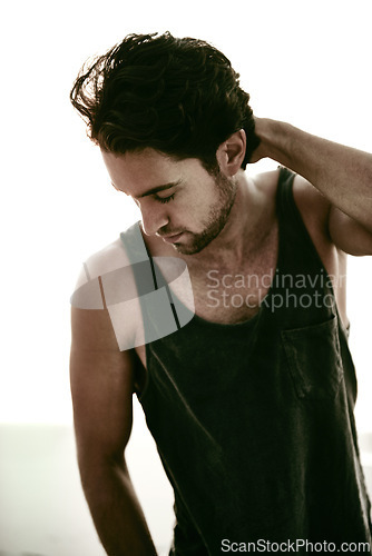 Image of Man, serious and confident in studio, thinking and planning for future outfit on white background. Male person, fashion and casual style or cool clothing on backdrop, contemplating and hairstyle