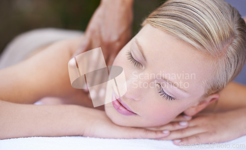Image of Woman, massage and masseuse to relax, neck and spa for treatment and stress relief therapy. Sleeping, therapist and wellness in resort, peaceful and hands for luxury bodycare and tranquility
