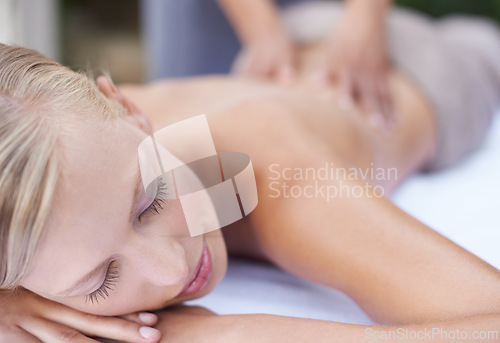 Image of Woman, massage therapist and spa for treatment, back and sleeping for wellness and stress relief therapy. Face, masseuse and relaxing in resort, peaceful and hands for luxury body care or tranquility