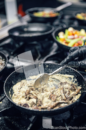 Image of Preparing food in the kitchen