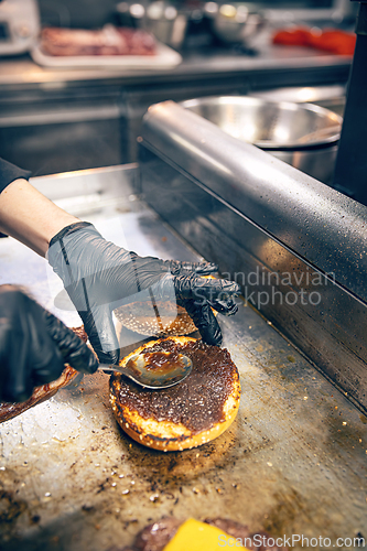 Image of Process of cooking hamburger.