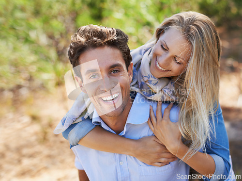 Image of Couple, portrait and happy in nature with piggyback in relationship for holiday, vacation or travel. Romance, man and woman with smile outdoor in forest with hug for bonding, love and relax in woods