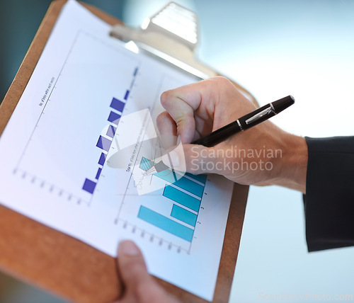 Image of Business hands, graphs and charts documents for data analysis, financial report and increase, revenue or profit. Professional person or auditor writing of bonus, increase and statistics on clipboard