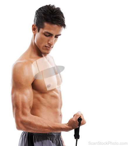 Image of Man, fitness and bicep with resistance band in workout or training on a white studio background. Active male person or muscular model curling arm for strength, muscle or body exercise on mockup space