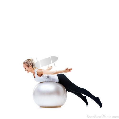 Image of Happy woman, fitness and exercise ball for balance training, workout or health and wellness on a white studio background. Active female person or athlete on round object for pilates on mockup space