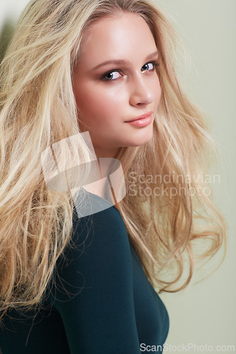 Image of Hair care, beauty and portrait of woman in studio with growth, texture or volume on wall background. Face, hairstyle and female model pose with shampoo, treatment or conditioner, shine for results