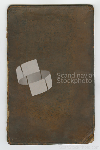 Image of Old book, vintage and cover of antique manuscript, scriptures or ancient literature against a studio background. Closeup of blank historical novel, journal or guide in brown, dusty or classic history