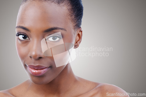 Image of Skincare, mockup and portrait of black woman in studio with smile, natural makeup or facial. Cosmetics, dermatology and face of happy girl on grey background space for healthy skin, shine or beauty.