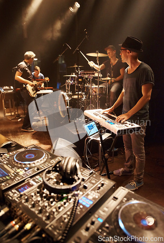 Image of Band, practice and performance of music at stage with people in preparation of production for concert. Sound, equipment and musician in theater ready for creative show with instruments and technology