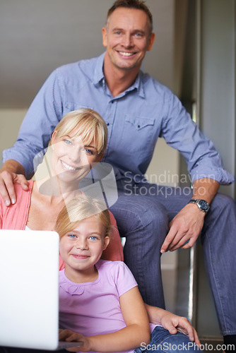 Image of Happy family, portrait and laptop in living room on internet and streaming subscription in apartment. Daughter, woman or man with smile face by online video on couch, technology or connected in house