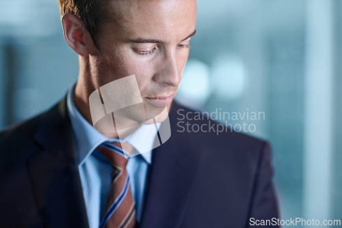 Image of Business man, face and professional in office for corporate career or job in company workplace. Entrepreneur, young agent and serious employee, worker in suit and confident consultant thinking alone