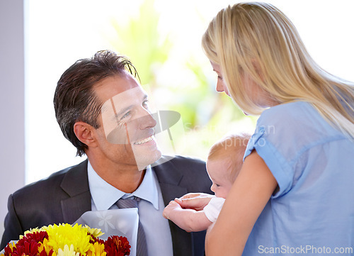 Image of Coming home with flowers, parents and baby in a house with love, support and bonding with gratitude. Happy family, bouquet and business man with floral surprise for first mothers day celebration