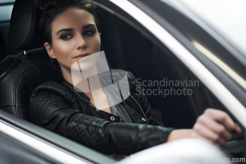 Image of Woman, car and thinking while driving for a roadtrip adventure in a luxury vehicle. Female person, vision and steering wheel of a transportation motor for trip with confidence to travel destination