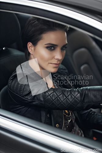 Image of Woman, car and view while driving on a journey or adventure in a luxury vehicle. Female person, roadtrip and steering wheel of a transportation motor for confidence on a travel destination trip