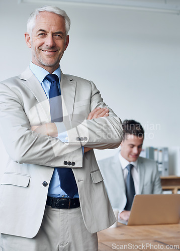 Image of Senior businessman, portrait and confidence in management, agency and pride for mentoring in office. Male person, arms crossed and happy for support in training, advisor and laptop for planning