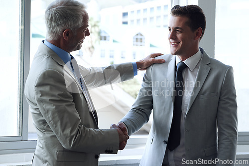 Image of Handshake, business people and agreement in promotion, congratulations and thank you for recruitment. Manager, employee and introduction or networking in office, collaboration and support in meeting