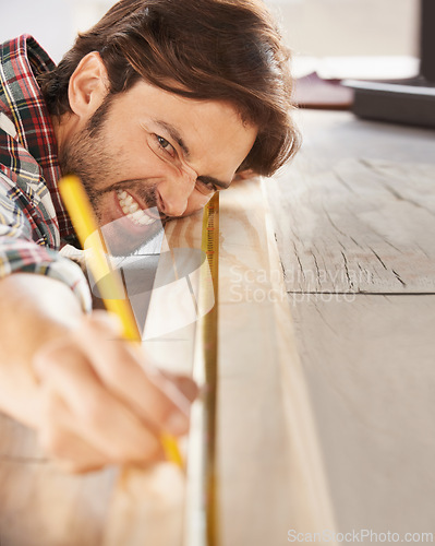 Image of Man, wood and carpenter with craft, diy and frustration for building, work and repair. Contractor, handyman and artisan with home improvement, maintenance and work for woodwork, struggle and skill