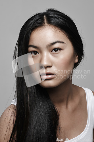 Image of Woman, portrait and cosmetic beauty in studio for make up confidence for Japanese, mockup space or white background. Asian person, model and wellness self care for dermatology, skincare or treatment