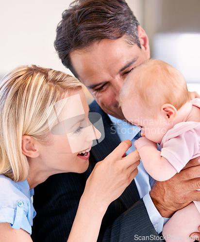 Image of Couple, love and closeup with home, baby and smile for happy, child and mother. Parents, daughter and kitchen with house kids and father for bonding, family and children with touch and holding
