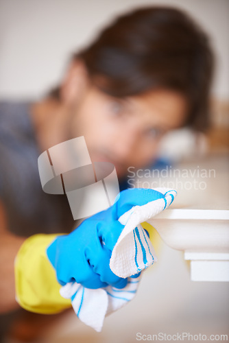 Image of Cloth, glove and cleaning for hygiene with cleaner person, disinfection and sanitize for housekeeping. Dust, dirt or germs with bacteria, closeup of fabric for maintenance and janitor wipe surface