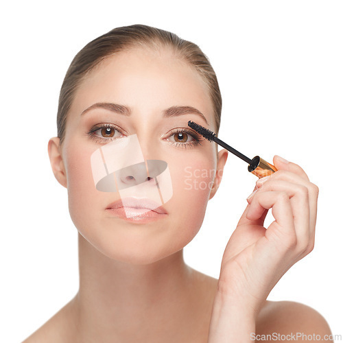 Image of Woman, face and skincare for beauty, mascara and makeup with lashes and cosmetology on white background. Portrait, wand for eyelash extension and skin, glow or shine with cosmetics product in studio