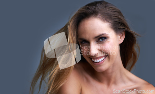 Image of Hair, portrait or happy woman in studio with cosmetic, shampoo or beauty results on grey background. Haircare, face or lady model with growth, shine or texture satisfaction or clean scalp confidence