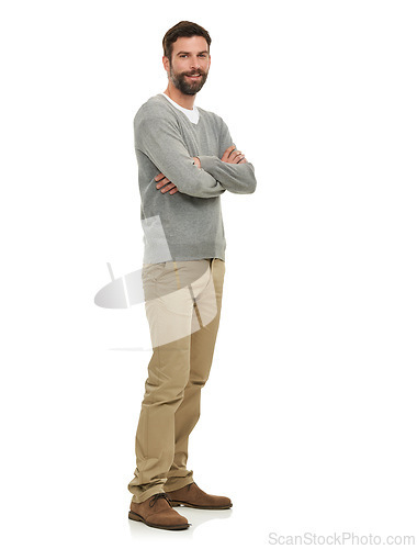 Image of Happy, man and portrait with arms crossed in studio with casual fashion, confidence and mock up space. Person, model and face with smile, pride and calm expression for edgy outfit on white background